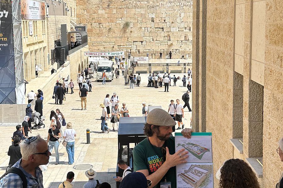 Ari explaining the Second Temple to a group above the Western Wall plaza
