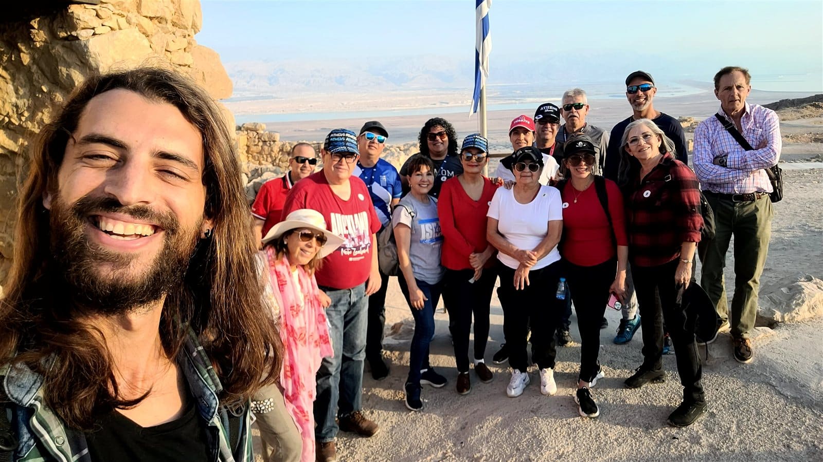 Ari with a private tour group at the Masada summit, overlooking the Dead Sea