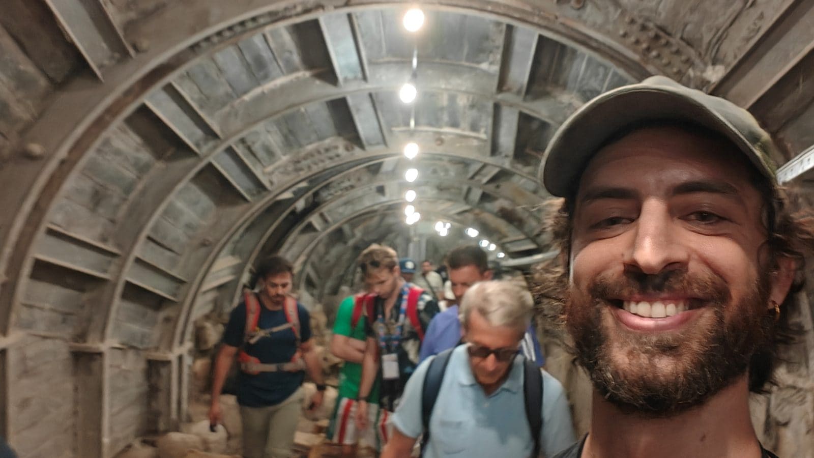 Ari with a group in an underground passage in Jerusalem's Old City