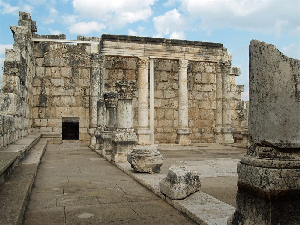 Columns and stonework of the ancient synagogue at Capernaum