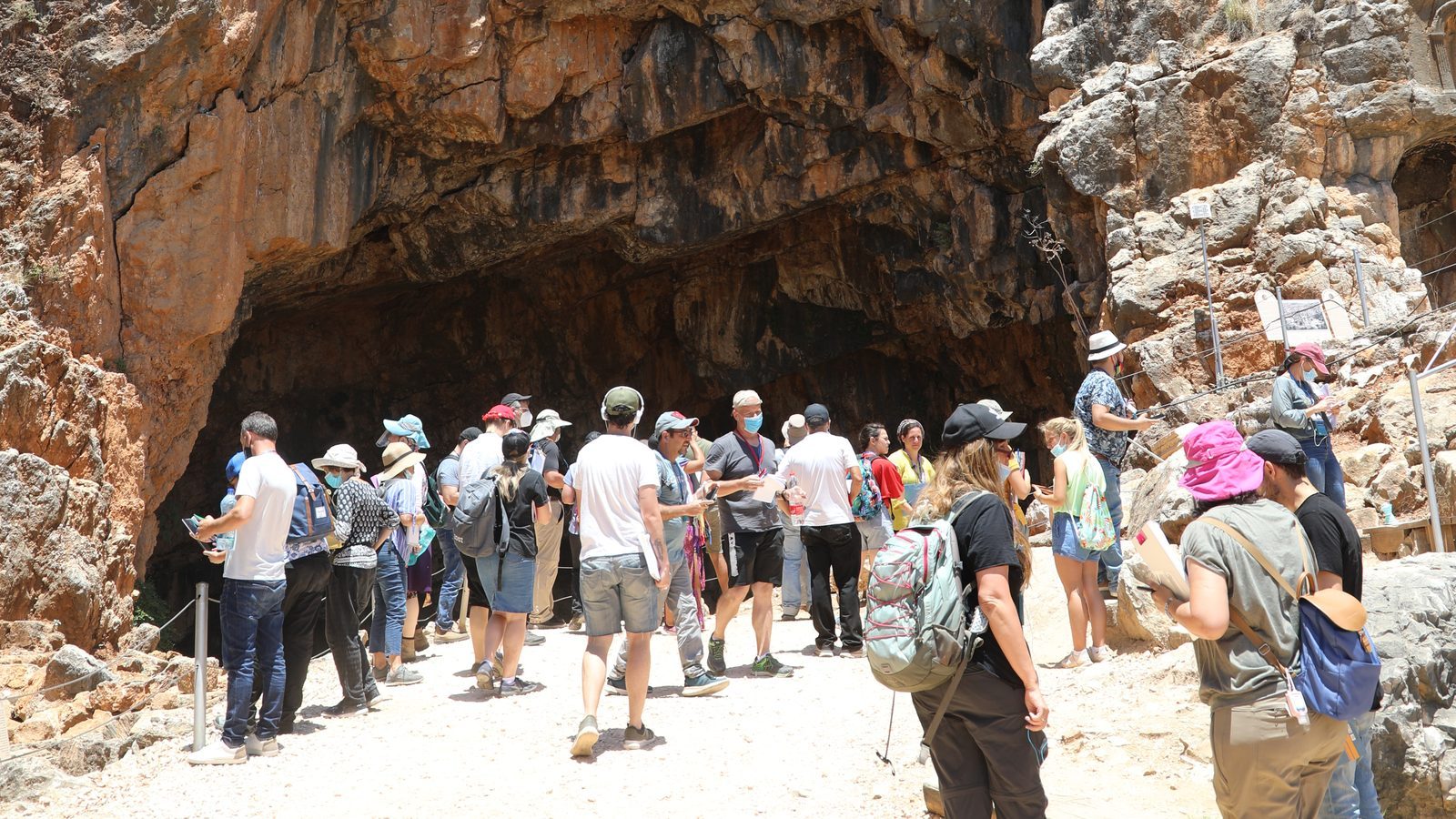 A large group listening to Ari at the Banias cave in the Golan